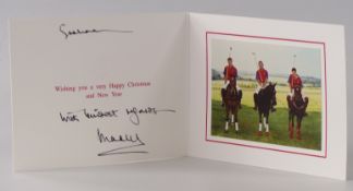 Prince Charles photographic Christmas card, depicting Charles, William and Harry on polo ponies,