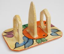Clarice Cliff for Newport Pottery Bizarre cafe-au-lait toast rack in Oranges pattern, length 12.5cm