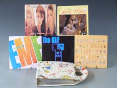 Approximately 200 singles from the 1960s to the 1980s including a 60s record carrier