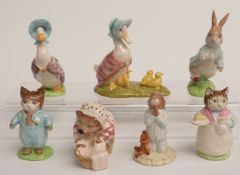 Six Beswick Beatrix Potter figures, one with gold backstamp and a Bedtime Bunnykins figure, most