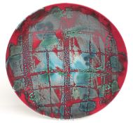 Poole Pottery charger decorated with a blue and red chequerboard glaze, diameter 41cm