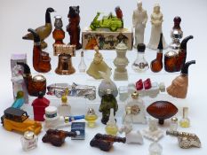 A collection of novelty scent/ perfume bottles including Avon, Versace etc