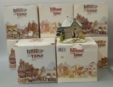 Eight Lilliput Lane models in boxes