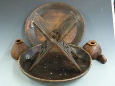 Carved African treen bowls, folding stool and two vessels, diameter of bowls 48cm