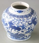 A 19thC Chinese vase decorated with animals in a landscape, six character mark to base , H 14cm