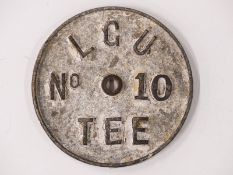 Edwardian Ladies Golf Union cast metal circular No.10 tee plaque, diameter 15cm