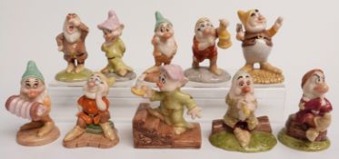 Eight Royal Doulton Snow White and the Seven Dwarfs figures in original boxes