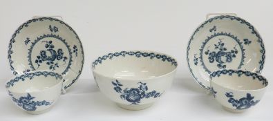 A collection of first period Worcester comprising two tea bowls and saucers and a slop bowl, largest