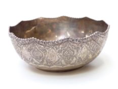 Iranian or similar Middle Eastern white metal bowl with engraved decoration and raised beaded