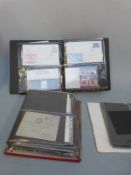 Two albums of presentation packs and first day covers, collection packs 1975, 76, 77, 79, 80 and