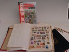 A Liberty album including a large section of Chinese stamps, two other albums, a 1987 Royal Mail