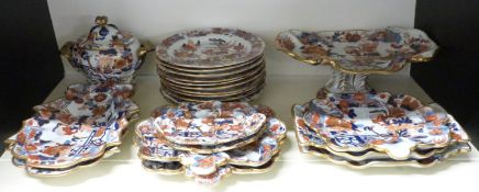 Masons ironstone early 19thC dinnerware decorated with storks in the Imari design, includes shaped