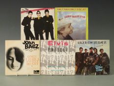 Approximately 40 singles including 20 by The Jam