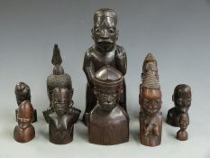 A collection of African hardwood figures, tallest 29cm