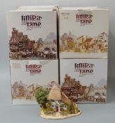 Eight Lilliput Lane models in boxes