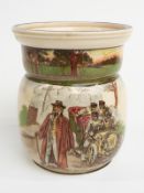 Royal Doulton Motoring Seriesware biscuit barrel decorated with a group of unruly motorists in a