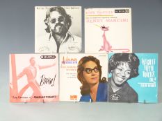 Approximately 330 singles, mostly 1960s and 1970s