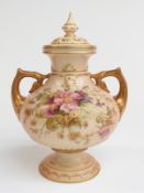 Royal Worcester blush ivory pedestal twin-handled covered pot pourri decorated with flowers, H22cm