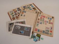 Two albums of all-world stamps
