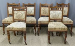 Set of six late 19thC/early 20thC dining chairs with turned front legs terminating in castors