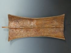 Turkan (Kenya) leather tribal shield with bentwood handle, probably 19thC, L78cm, W34cm
