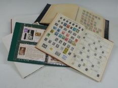 Four albums of mainly foreign stamps, a large unused stockbooks and two unused albums