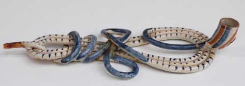 Prattware early 19thC puzzle pipe with mask decoration, L27cm