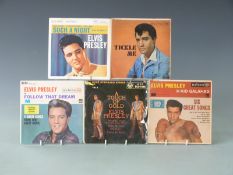 Approximately 40 Elvis Presley EPs and singles including Love Me Tender (7EG 8199) and Good