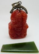 Chinese pendant with a white metal pendant mount set with paste and a nephrite jade plaque