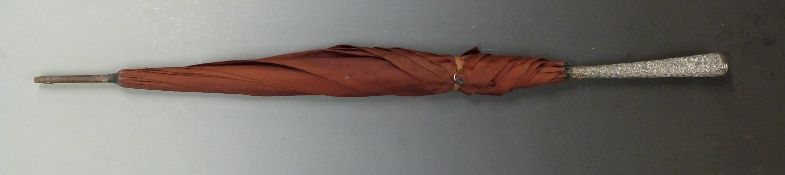 An early 20thC parasol with Chinese silver handle, L90cm