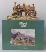 Three Lilliput Lane models in boxes including The Kings Arms, Anne of Cleves and Anne Hathaway
