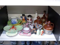 Carlton Ware trefoil lobster dish and cruet, Hummel figures, Wade bells, Toby jugs, further salad