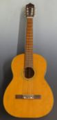 Acoustic guitar, unlabelled with steel reinforced rod, nylon strings and soft case