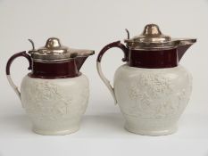 Two circa first quarter 19thC graduated Davenport relief moulded jugs with hallmarked silver