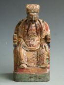 A 19thC Chinese wooden temple figure with gilt decoration, H 27cm