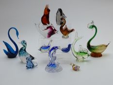 Thirteen Wedgwood, Murano and similar glass paperweights and sculptures all in the form of