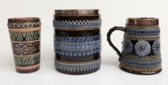 Three Doulton Lambeth items - a beaker with hallmarked silver mount signed Ernest R Bishop,