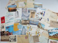 A box of cigarette cards and postcards, some in an album, includes QEII, BOAC etc