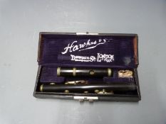 Hawkes & Son piccolo with composite body and nickel keys, stamped with 'Excelsior Sonorous Class'
