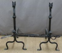 Pair of blacksmith made fire dogs with novelty dog head finials together with various similar fire