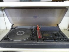 Sharp stereo music centre SG-320E with turntable and four band radio cassette player