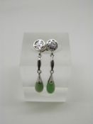 A pair of 14k white gold Chinese earrings with Chinese character studs and tear drop jade section