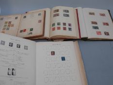 A Windsor album of British stamps, two Commonwealth albums and an Improved album of all world