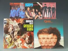 Approximately 40 albums including Pink Floyd, AC/DC and ZZ Top, and approximately 40 singles