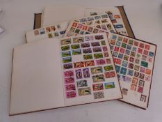 Five albums of GB, Commonwealth and foreign stamps