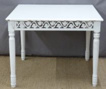 White painted dining table with carved and pieced decoration, L100 x W100 x H77cm