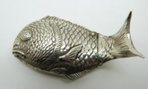 Arthur & Bond Japanese white metal novelty fish pepper with hinged tail, marked Arthur & Bond