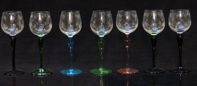A set of six glass drinking glasses with engraved bowls and coloured stems and feet, 19.5cm tall