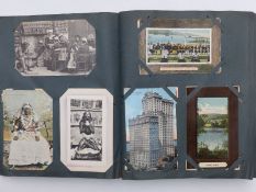 A postcard album, Edwardian onwards, including Malta, New York, Cardiff, Brazil, Donald McGill,