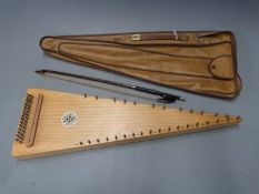 Bowed psaltery by Hopf of Germany, in light fruitwood with 30 steel strings and bow, in soft carry